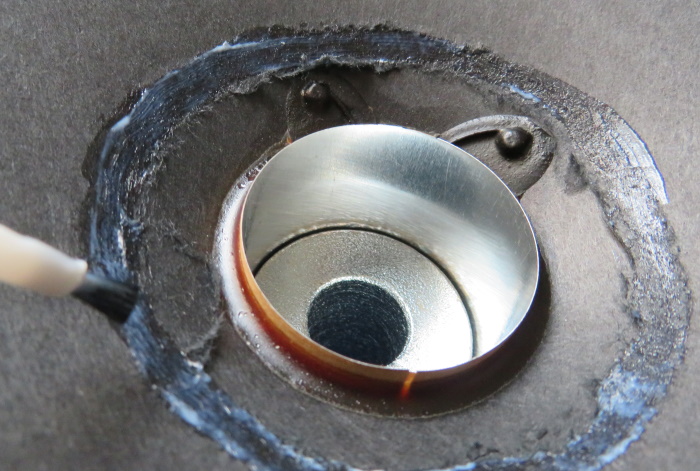 Speaker dust cap replacement - apply glue to the speaker cone