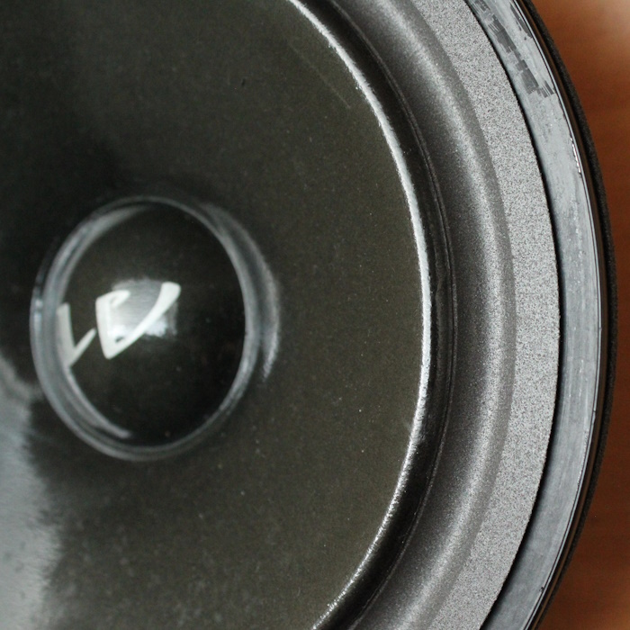 The 'inverted roll' of the foam surround must fit well with the edge of the woofer cone